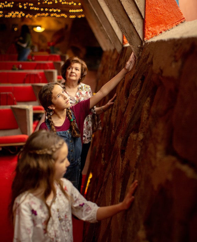 two young girls exploring taliesin west with an older female relative